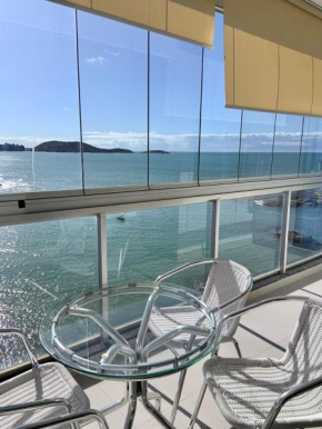 Apartamento vista do mar, pé na areia e águas tranquilas, no cento de Guarapari